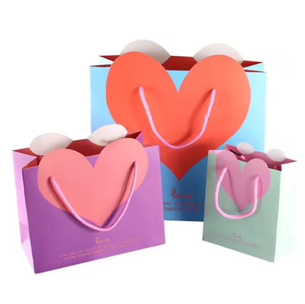 Desenho personalizado Negro Roupa de luxo Shopping Tote Arte presente bolsas de papel para roupas