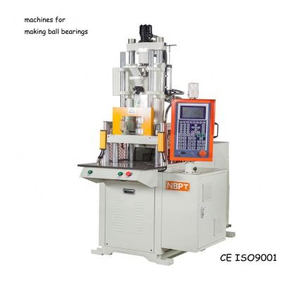 Máquina de moldeo por inyección vertical para la fabricación de bolas de golf