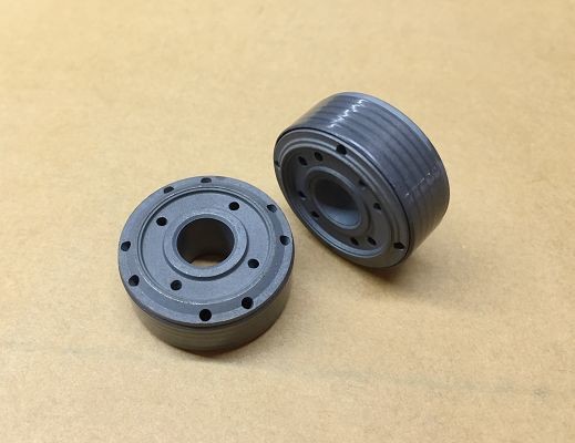 Низкий поршень амортизатора удара коэффициента трением с iniclined отверстием