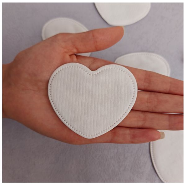 Discos de algodón desechables biodegradables en forma de corazón ecológicos OEM para desmaquillar