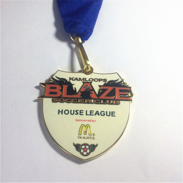 Metal enamel medal in the form of a T-shirt as a commemorative item