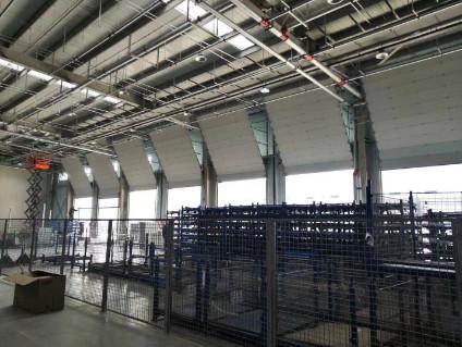 Portas seccionais industriais de aço HDG Portas seccionais de aço isoladas personalizadas