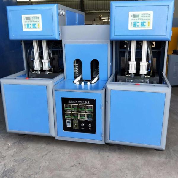 Автоматическое оборудование для дуновения бутылок с силой сцепления 35 кН и максимальной высотой бутылки 380 мм