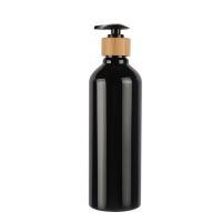 Bouteille de lotion cosmétique en PET à épaule ronde noire avec pompe à lotion en bambou naturel