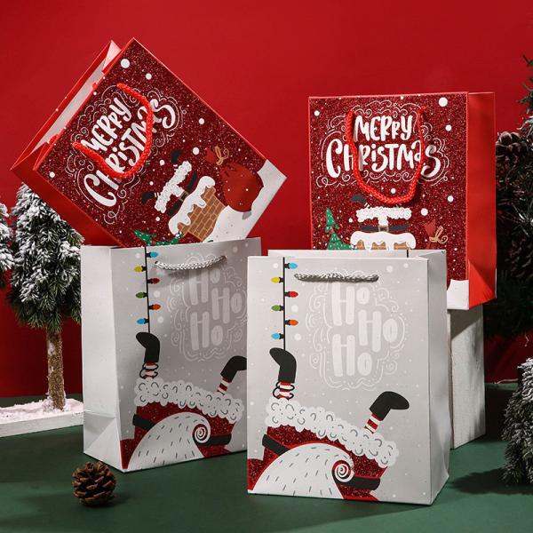 O presente de papel a favor do meio ambiente do Natal do FSC ensaca 32g/PCS