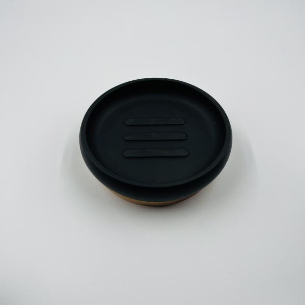 Ensemble de salle de bains en polyrésine noir et blanc en forme ronde en bois avec une partie de savon et un ensemble de comptoirs de salle de bains