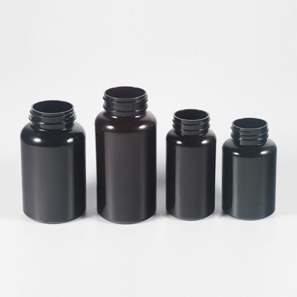 Highly Customized 4oz PET Capsule Bottle of Orange Black Plastic Nutrition Supplement with Purple Tamper Proof Packaging