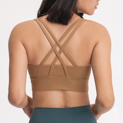 Do sutiã à prova de choque traseiro sexy dos esportes da aptidão do sutiã da ioga das mulheres da cruz da camuflagem elástico alto