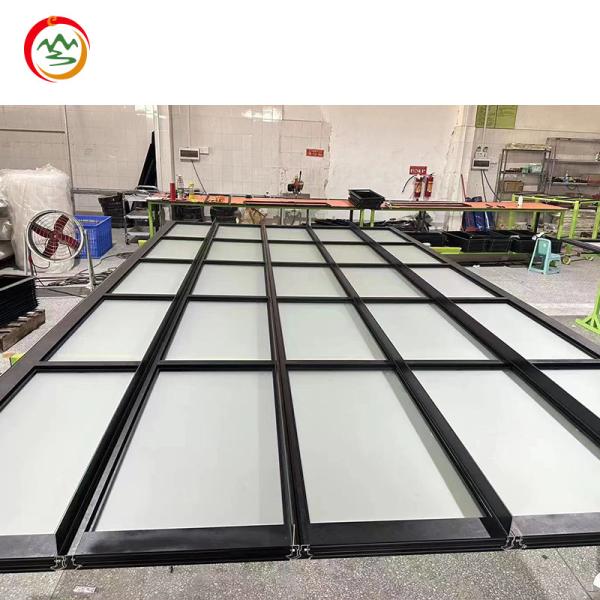 Modern Frosted Glass Garage Door Anti-Theft Features New Black Aluminum Alloy Section Panel Automatic Open Style Home Use Motor
