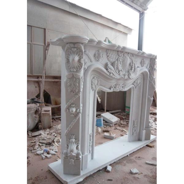 White marble fireplace mantel