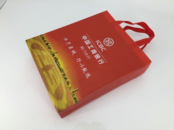 Manufacturer custom logo color printing non woven bags with handle/100gsm