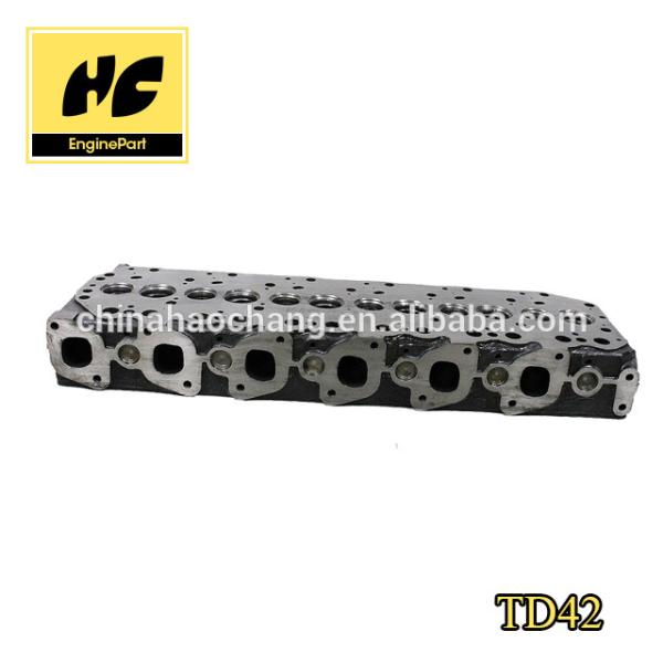 Provide More Brand TD42 Auto parts Engine Cylinder head assy used For Nis san OE No 11039 06J00