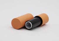 Les tubes vides BulkRound de baume à lèvres de toucher doux en caoutchouc orange se sont givrés