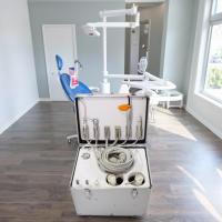 Unité dentaire portable 220V à traction à la tige avec lampe de curage et étalon dentaire