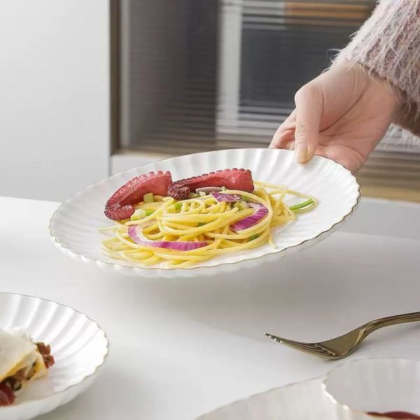 Ceramic tableware bone dinnerware crafted from natural materials with bright glaze and unique scalloped wave edge design