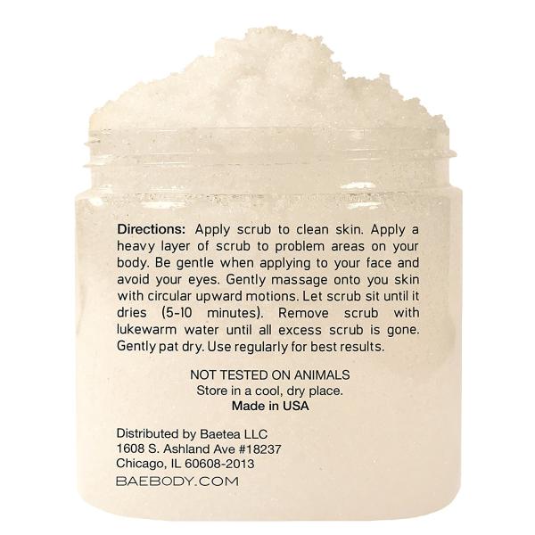 Le corps de soins de la peau de noix de coco de lait frottent contiennent l'huile d'amandes de sel de mer morte et la vitamine E
