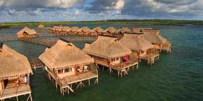 O bungalow amarelo de aço de Overwater da casa pré-fabricada moderna laminou a pavimentação de hotel pré-fabricado
