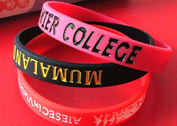 Low Relief Custom Silicone Rubber Wristbands Embossed Logo Lettering Raised