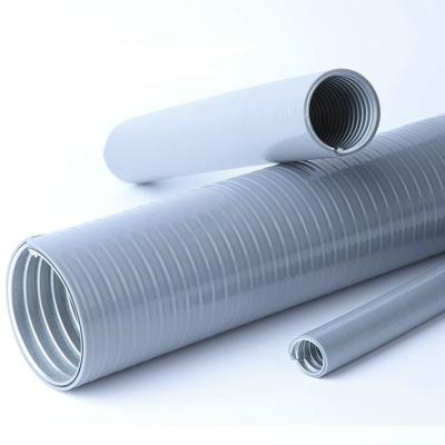 Na parede/no subsolo a canalização elétrica flexível galvanizou o material de aço