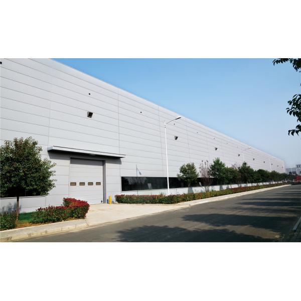 Station de pompiers Automatique Porte de levage industrielle lourde Porte de levage industrielle sectionnelle en PU avec conception étanche aux intempéries et porte sectionnelle industrielle