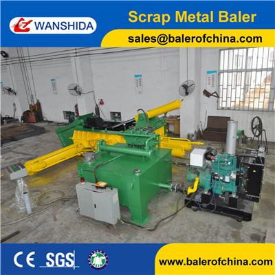 Scrap metal baler diesel drive with hopper