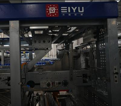 Adjustable Speed Bottled Water Packaging Machine For Still / Sparkling Water