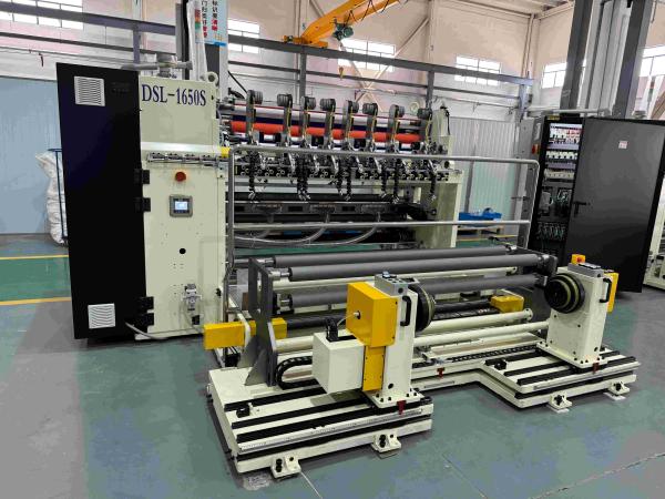 Ligne de refente de bobines d'acier pour machine à ligne