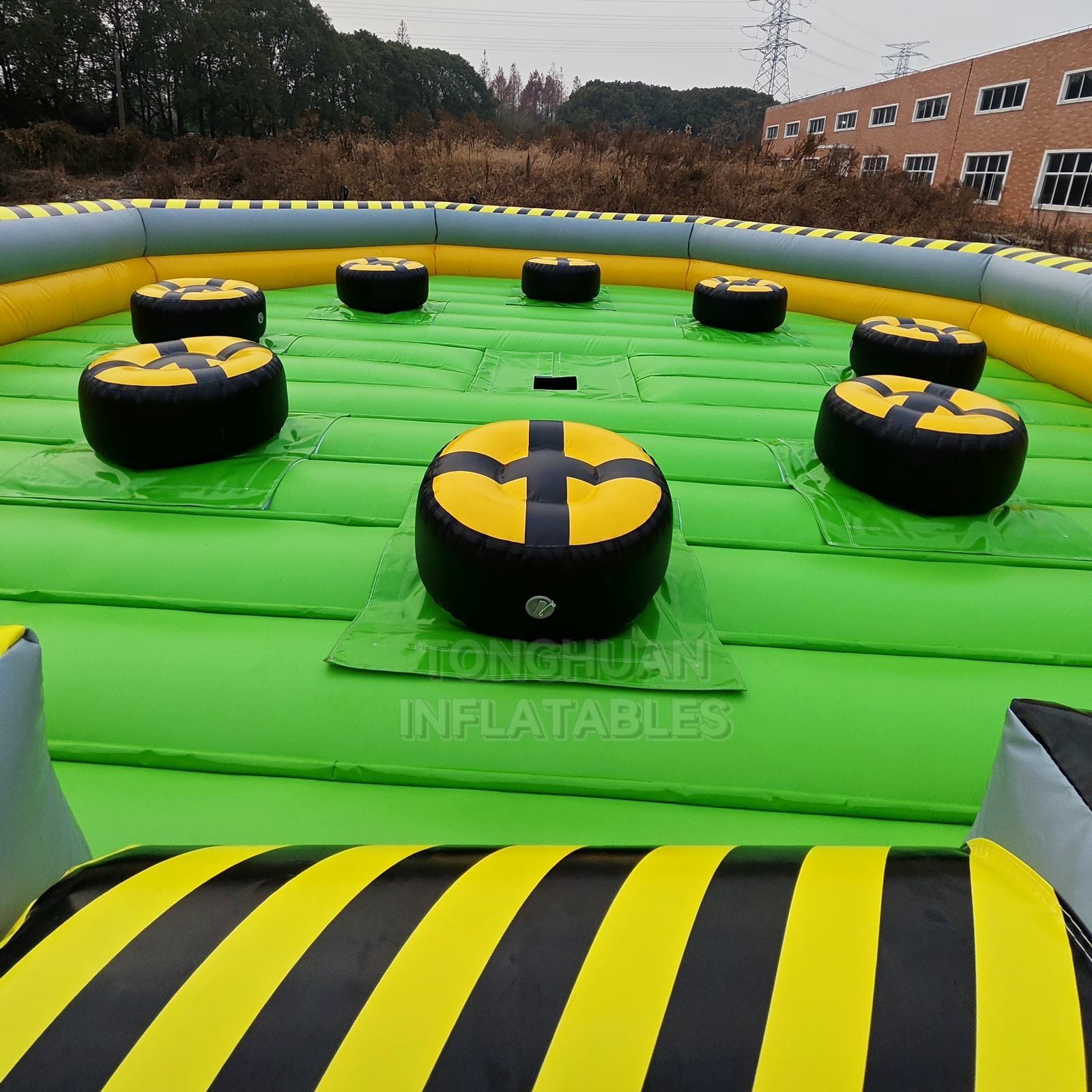 Commercial Inflatable Rotating Challenge Arena with Player Podiums and Safety Walls for Events Parks and Team Competition Games
