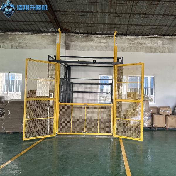 Heavy Load Hydraulic Lift Hydraulic Cargo Lift Elevator With Emergency Stop Smooth Vertical Transport