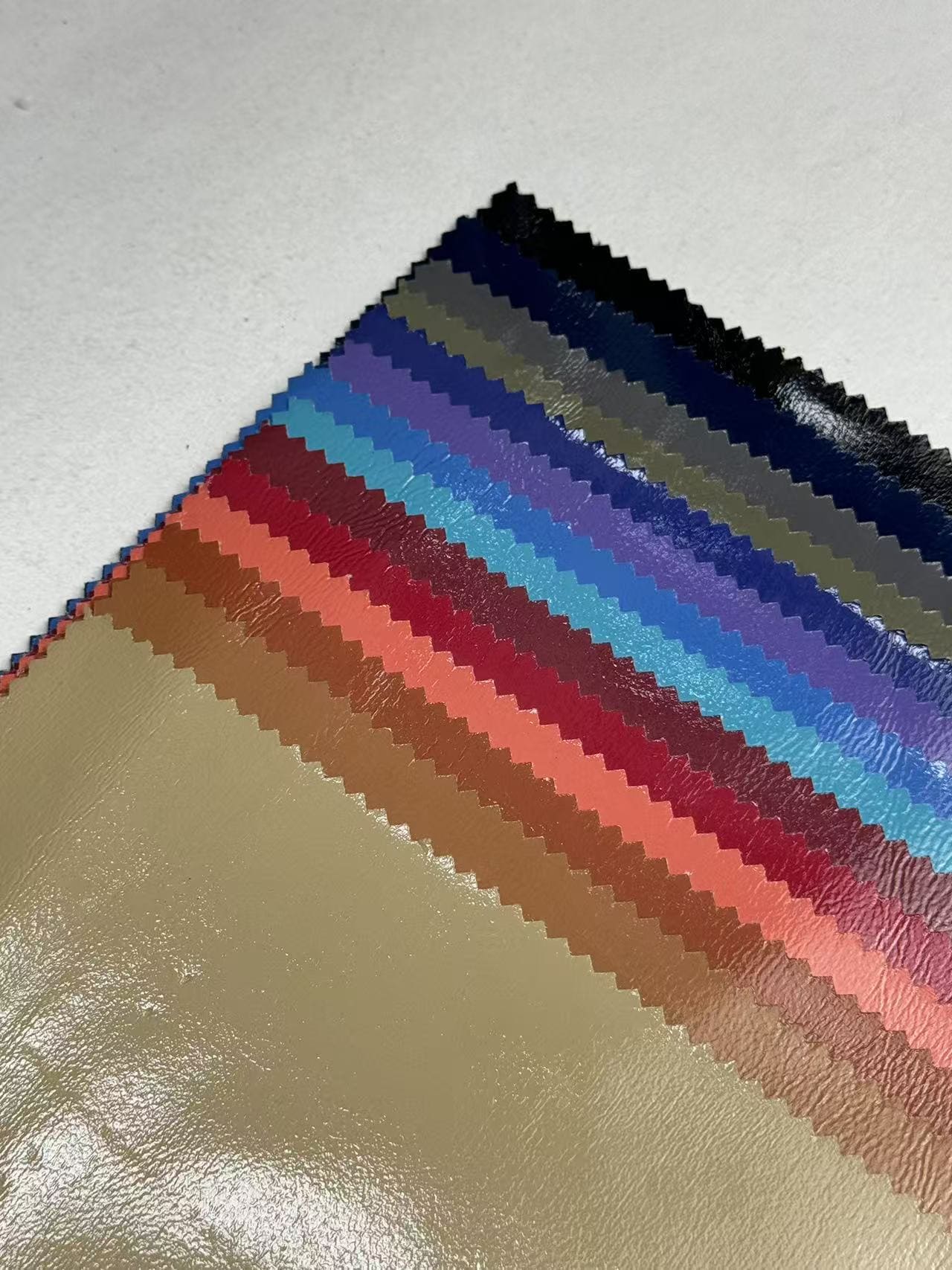 New Design Embossed PU Synthetic Waterproof Leather Fabric with Elastic for Garment Jacket Upholstery