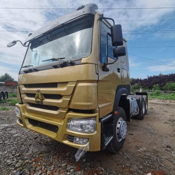 Customized Request Carbon Steel Cargo Box HOWO Tractor Truck with 1000L Fuel Tank