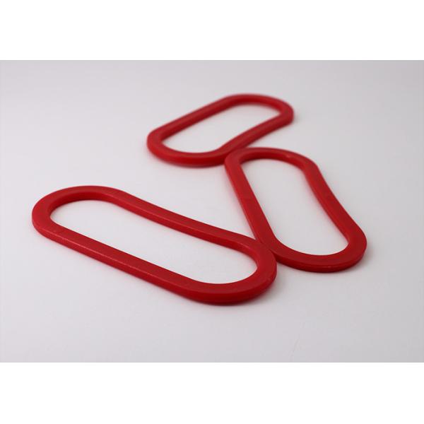 Poignée de transport en plastique rouge de sac d'épicerie pour les marchandises