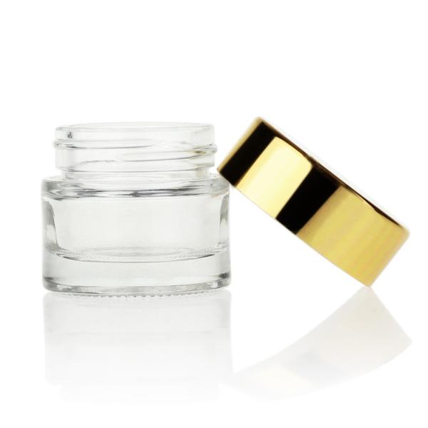 O cosmético de vidro claro luxuoso do OEM 10g range a tampa do ouro clara para o creme