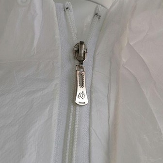 Белые устранимые средства индивидуальной защиты ППЭ Ковералльс 70г