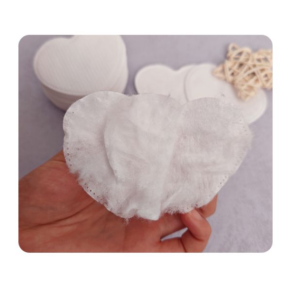Discos de algodón desechables biodegradables en forma de corazón ecológicos OEM para desmaquillar