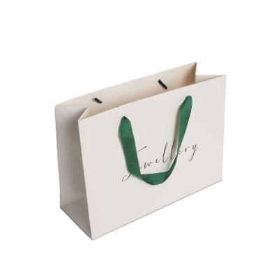 Impressão de gravura de logotipo personalizado Bolsas de presente de Natal com logotipo Bolsa de compras Bolsa de papel duro