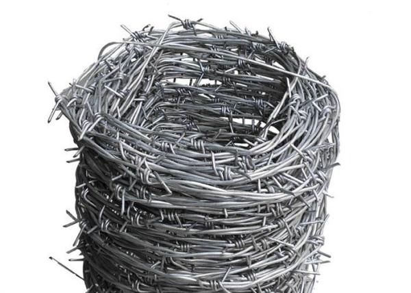 Galvanizado/Pvc revestiu o arame farpado do aço de 2.0mm para o campo que cerca 25kg/Roll