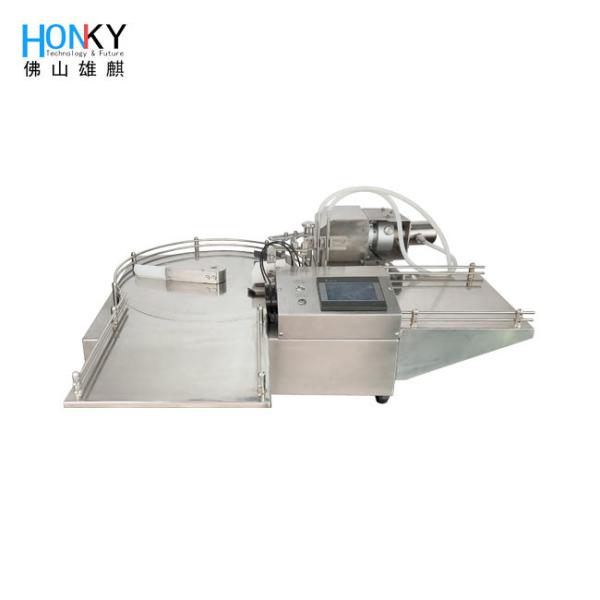 Machine de remplissage de bouteilles rondes de bureau avec système de remplissage à double tête pour le remplissage essentiel de liquide d'huile