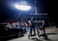HMI que ilumina o hélio de Sourse enchido iluminando os balões que flutuam no ar para o tiro da tevê do filme