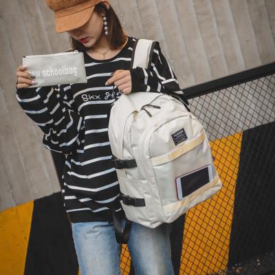 Korean version of the couple transparent solid color cloth standard letters multi-purpose backpack