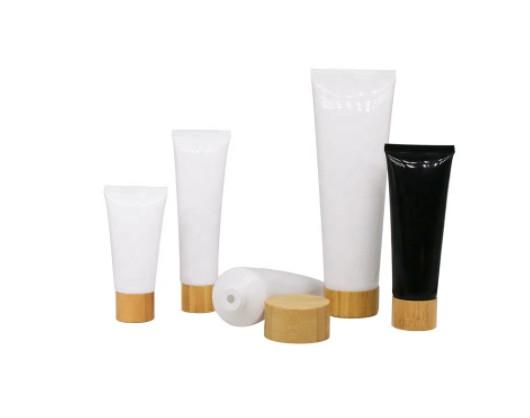 plastic soft tubes with screw cap / empty cosmetic cream bottles with bamboo