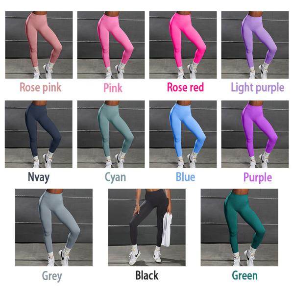 Las mujeres empujan hacia arriba los pantalones de funcionamiento de la yoga de la aptitud de las polainas del extremo del arrugado