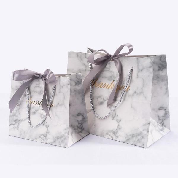 Customized Sealing Handle Gift Bags with Bows for Clothing Jewelry and Gift Packaging