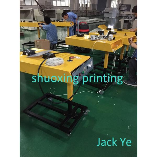 Carousel screen printing press for garments