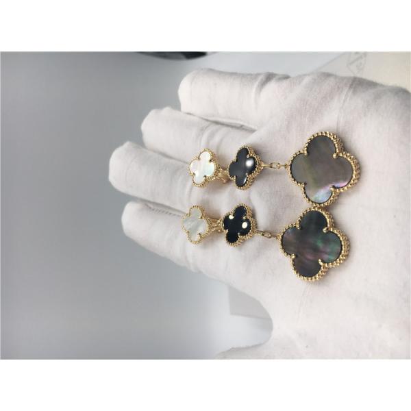 Van Cleef Arpels Magic Alhambra earrings 18k yellow gold with white and gray mother-of-pearl