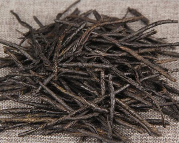 Yunnan wild leaves kuding tea super high mountain qingshan green water kuding under fire tea taste bitter