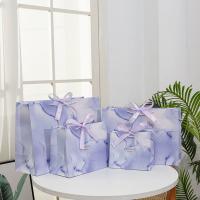 Bolso de compras de regalo de mano de nuevo estilo de color personalizado con diseño de logotipo Bolso de compras de papel Kraft