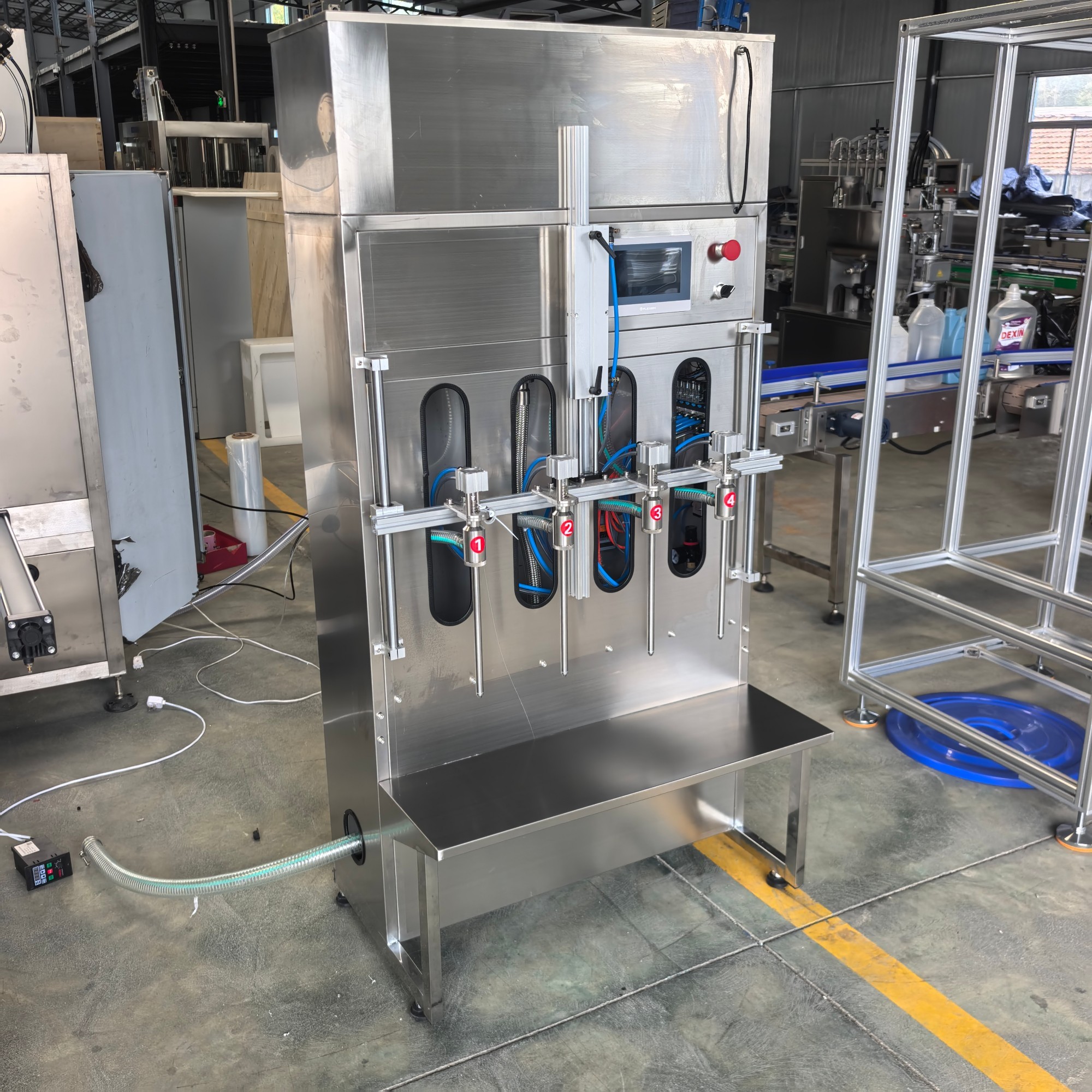Semi Automatic Gravity Flow Filling Machine 316L Stainless Steel for Low Medium Viscosity Liquid
