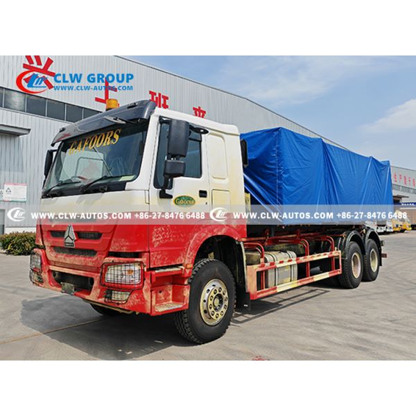 Sinotruk HOWO RHD 6x4 25-Ton Hook Lift Garbage Truck with Weichai 400HP Engine for Heavy-Duty Waste Collection