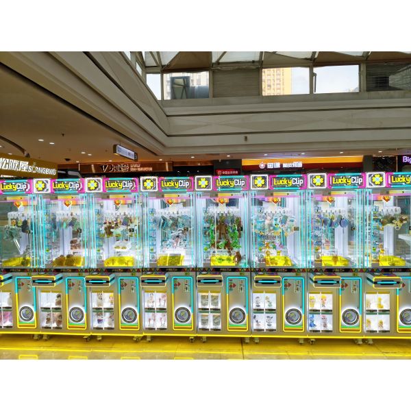 60kgs LED Lights Coin Operated Lucky Clip Game Machine Mini Dolls Claw Machine For Kids Adults Amusement Game Center Offering Interactive Entertainment Options